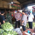 Giat Polsek Cikarang Barat Bagikan Masker di Pasar Induk Cibitung