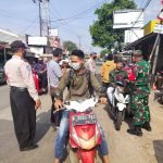 Polsek Cibarusah Rutin Anjurkan Warga Serta Pengguna Jalan Untuk Selalu Gunakan Masker