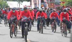 Korem 131 Bersama Bank BRI Sulut Gelar Fun Bike, Tabur Benih Ikan di Danau Tondano