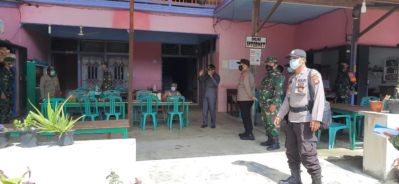 Koramil Tanah Pinoh Bersinergi Dengan Polsek Himbau Warga Agar Tetap Waspada Dari Wabah Virus Corona 1 IMG 20210609 WA0083