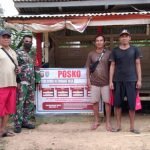 Ingatkan Prokes, Babinsa Ketungau Hulu Cek Posko PPKM Mikro