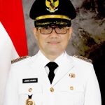 HUT Emas ke-50 Tahun Bupati Minut Joune Ganda Bagikan Berkat ke Masyarakat