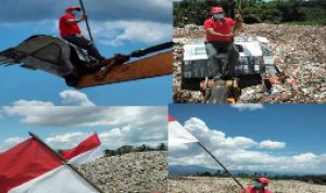 Semarakan HUT RI ke-76, Kadis DLH Porawouw Kibarkan Merah Putih di Atas Ekskavator TPA Sumompo