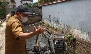 Dinas PUPR Manado Johny Suwu Targetkan Pengerukan Anak Sungai Tikala Selesai Minggu Ini