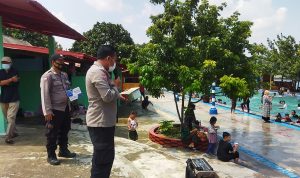 Bhabinkamtibmas Polsek Cikande Tinjau Obyek Wisata Kolam Renang Taman Tirta Lestari Pastikan Penerapan Prokes Berjalan