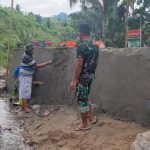 Dibantu Warga, Satgas TMMD ke-113 Kodim 1303/BM Hampir Rampungkan Pekerjaan Plat Duiker