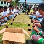 Demi Generasi Muda Papua, Satgas Yonif Raider 142/KJ Ajak Siswa Sekolah Minum Susu