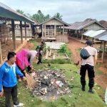 TNI-Polri Bersama Warga Kampung Tanjung Raya Bersinergi Lakukan Jum’at Bersih