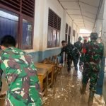Prajurit Yonif 141/AYJP Bantu Masyarakat Terdampak Banjir di Desa Sepang