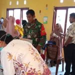 Dukung Balita Sehat, Babinsa Koramil 1512/Weda Lakukan Pendampingan Posyandu
