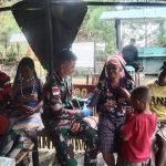 Satgas Yonif Raider 200/BN Gelar Pengobatan dan Pangkas Rambut Gratis