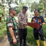 Babinsa Kodim Kodim 0404/ME dan Bhabinkamtibmas Bersinergi Sosialisasikan Bahaya Karhutla ke Masyarakat