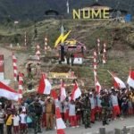 Bersama Satgas 712/Wiratama dan Warga Distrik Nume dalam Kirab Merah Putih